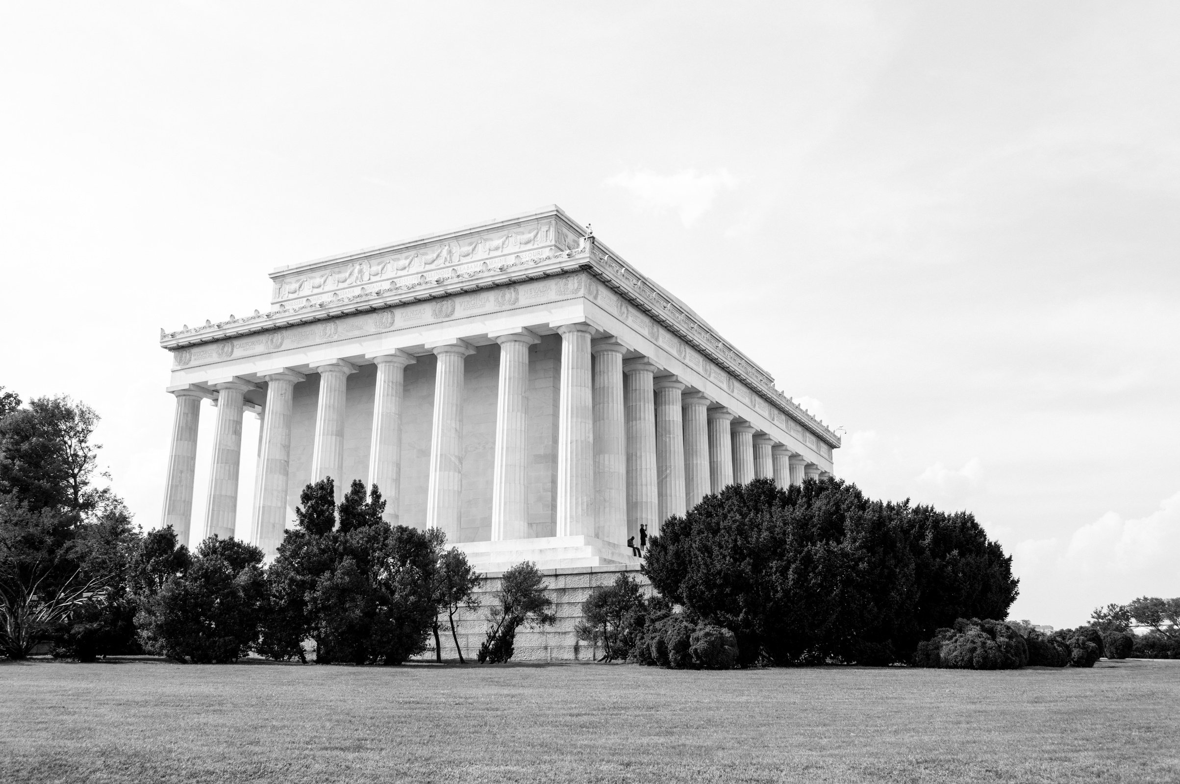 Grayscale Photo of Concrete Building